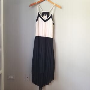 Leo Meets Virgo Pleated High Low V Neck Dress